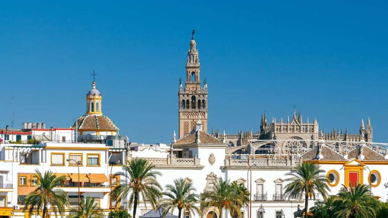 Seville: Tasting, History, Market visit and Tapas Tour - Crossing Triana Bridge to the market