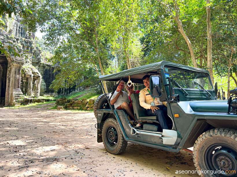Siem Reap: Angkor Wat Sunrise and Market Tour by Jeep - Bayon’s stone faces and Victory Gate