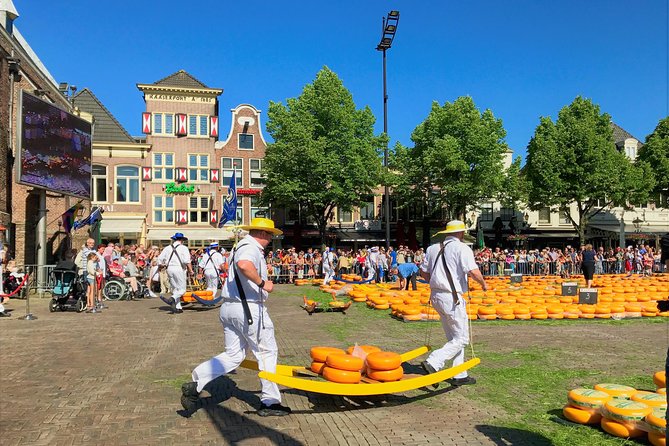 Small Group Alkmaar Cheese Market and City Tour <em>English</em> – Key points to know before booking’ /></p>
<ul>
<li><strong>Cheese carriers in action:</strong> Spend about 90 minutes watching cheese weighed, traded, and moved in the traditional way.</li>
<li><strong>A guide who knows the town:</strong> Jennifer offers local stories, practical context, and insight from living in Alkmaar.</li>
<li><strong>Small group access:</strong> With a maximum of six people, it is easier to hear the guide and ask questions.</li>
<li><strong>A useful old-town walk:</strong> See the Great St Lawrence Church, City Hall, canals, cobbled streets, and the Weigh House.</li>
<li><strong>Cheese tasting included in the experience:</strong> You may try several Dutch cheeses, with purchases available separately.</li>
<li><strong>Plan for Friday morning:</strong> Meet at 9:00 a.m. outside Alkmaar train station and finish in the city center.</li>
</ul>
<h2>Why Alkmaar’s cheese market is worth a morning</h2>
<p><img width="669" height="446" decoding="async" src=