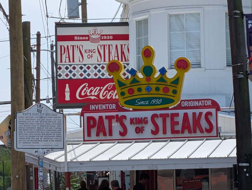 South Philly Tour: Market, Cheesesteaks & Hidden Gems - Walking Through the Italian Market on 9th Street