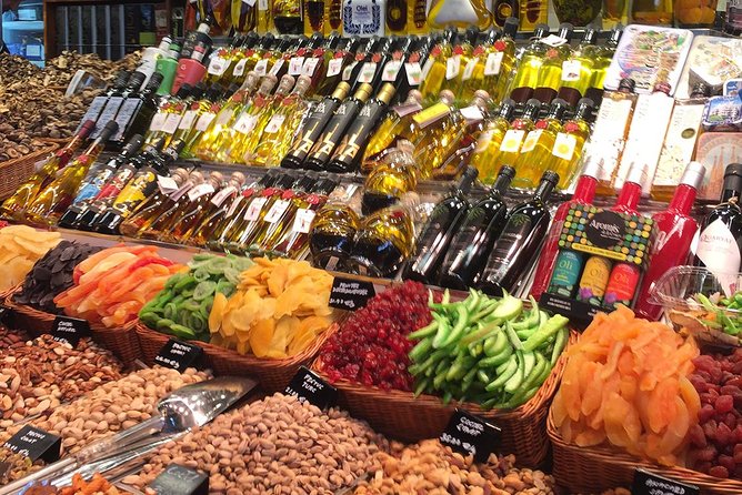 Taste of Barcelona: Boqueria Market, Tapas & History Tour - Through the Gothic Quarter’s narrow lanes
