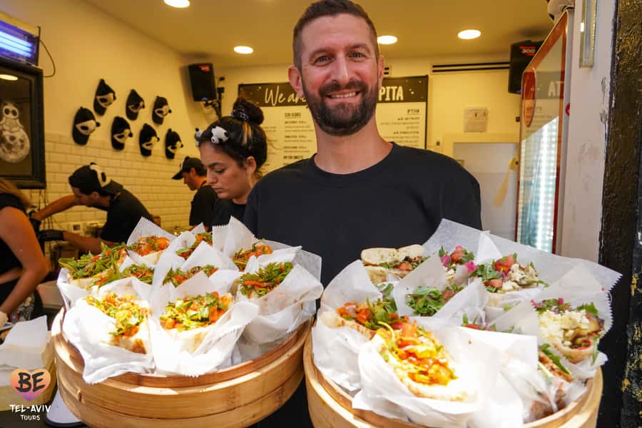 Tel Aviv: 2-Hour Carmel Market Tour in English with Lunch - Stories that give the market some shape