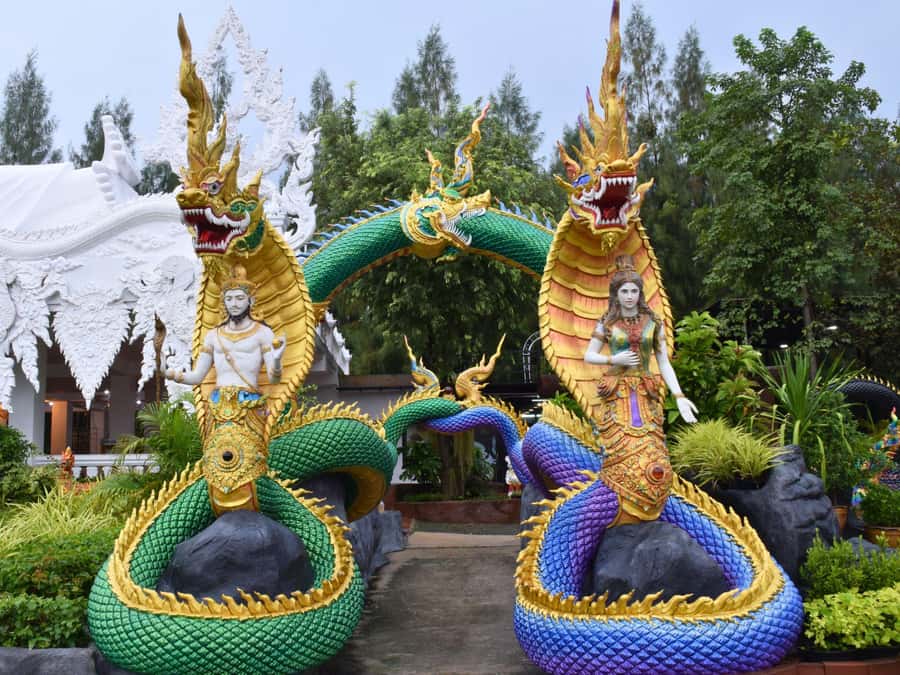 The Souls BKK: The Spirits of Dragons and Floating Market - Climbing through Wat Samphran’s dragon