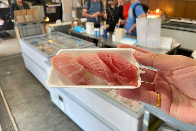 Tokyo Food Tour Taste Fresh Delights at Tsukiji Market - The opening walk from Lawson Tsukiji 4 Chome Store
