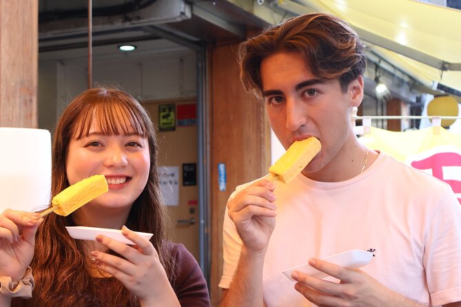 Tokyo: Private Tsukiji Fish Market Tour with 3 food stops - A short stop at Tsukiji Uogashi Kaiko Bridge Building