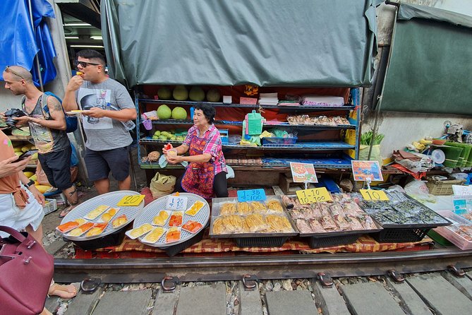 Train & Floating Market Food Adventure + Scenic train ride - Food tasting with a guide beside you
