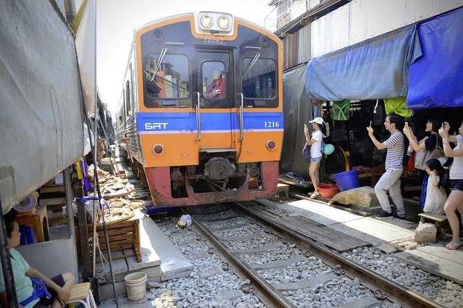 Unique Bangkok Markets: Train Market & Floating Market Adventure - Price, timing, and cancellation details