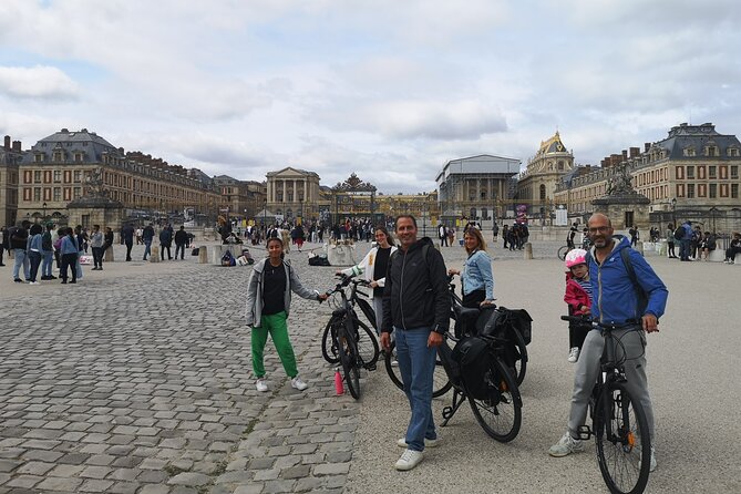 Versailles Full-Day Electric Bike Tour : Market, Picnic & Palace - Place du Marché Notre Dame is the day’s tastiest stop