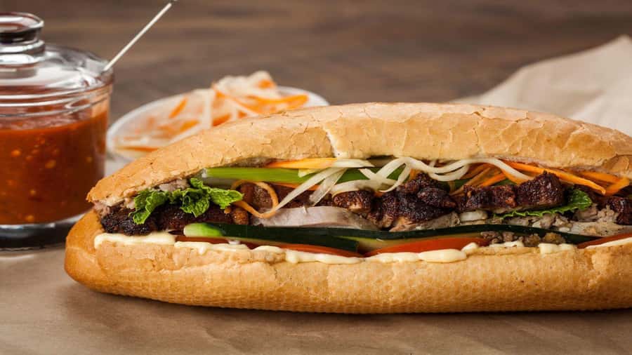 Weekend Hanoi Night Market & Street Food Tour - The first plates: rolls, rice, and local habits